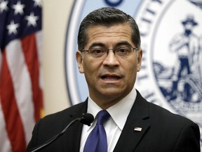 FILE - This Aug. 14, 2017 file photo California Attorney General Xavier Becerra speaks during a press conference at San Francisco City Hall. Becerra is concerned about open-ended immigration sweeps when he and other officials say the Trump administration should be concentrating on deporting dangerous felons. Becerra said Wednesday, Jan. 17, 2018, that it is the federal government's responsibility to protect the nation's borders.