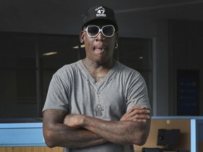 FILE - In this June 14, 2017, file photo former NBA basketball star Dennis Rodman listens to a guide at the Sci-Tech Complex in Pyongyang, North Korea. Police say Rodman has been arrested on suspicion of DUI in Southern California. Lt. Rachel Johnson of the Newport Beach Police Department says Rodman was pulled over late Saturday, Jan. 13, 2018, for a traffic violation. Johnson says officers administered a field sobriety test, which Rodman failed. Rodman was released from custody Sunday morning.
