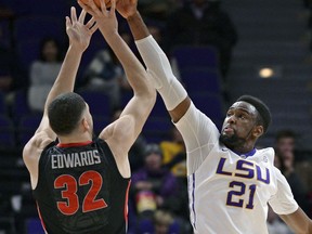 LSU forward Aaron Epps (21) defends against Georgia forward Mike Edwards (32) during the first half of an NCAA college basketball game, Tuesday, Jan. 16, 2018 in Baton Rouge, La.