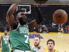 Boston Celtics guard Jaylen Brown dunks during the first half of the team's NBA basketball game against the Los Angeles Lakers on Tuesday, Jan. 23, 2018, in Los Angeles.