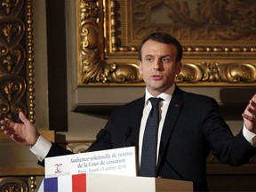 FILE - In this Monday, Jan. 15, 2018 file photo, French president Emmanuel Macron delivers his speech during a ceremony at The Cour de Cassation, France's highest judicial court, at the Paris courthouse, in Paris. French President Emmanuel Macron told the BBC in an interview broadcast Sunday Jan. 21, 2018, he shared the outrage of many African countries in response to President Donald Trump's disparaging comments about the continent.