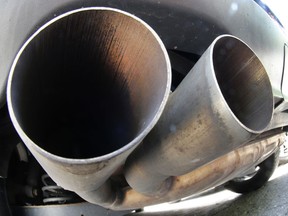 FILE - In this Aug. 2, 2017 file photo the exhaust pipes of a VW Diesel car are photographed in Frankfurt, Germany. The chairman of Volkswagen says that diesel exhaust tests involving monkeys were "totally incomprehensible" and the matter must be "investigated fully and unconditionally." Monday's comments by Hans Dieter Poetsch, reported by the dpa news agency, come in the wake of a report by the New York Times that a research group funded by auto companies exposed monkeys to diesel exhaust from a late-model Volkswagen, while another group was exposed to fumes from an older Ford pickup.