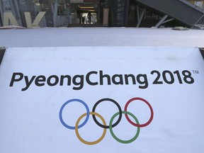 The Olympic rings with a sign of 2018 Pyeongchang Games is seen at the Imjingak Pavilion in Paju, South Korea, Friday, Jan. 19, 2018. The head of North Korea's most popular girl band is visiting South Korea this weekend to check preparations for a trip by another art troupe from the North.