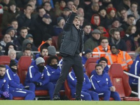 Chelsea's manager Antonio Conte shouts to his team during the English Premier League soccer match between Arsenal and Chelsea at Emirates stadium in London, Wednesday, Jan. 3, 2018.