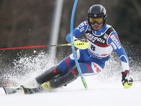 FILE - A Thursday, Jan. 4, 2018 file photo of Russia's Alexander Khoroshilov competing during an alpine ski, men's World Cup slalom in Zagreb, Croatia. Khoroshilov tells The Associated Press he is not distracted by fallout from the Sochi doping scandal. That has made him wait for an IOC invitation to join a team of Russians judged clean of suspicion to compete in South Korea next month.