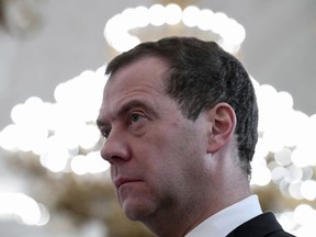 In this Thursday, Dec. 28, 2017 file photo, Russian Prime Minister Dmitry Medvedev attends an award ceremony in the Kremlin, in Moscow, Russia.  The Trump administration has released a list of 114 Russian politicians and 96 "oligarchs" it says are linked to Russian President Vladimir Putin, but it's decided not to issue any extra sanctions for now. Medvedev was previously Russian president from 2008 through 2012. That was in a "tandem" arrangement with Putin, who left the presidency to become prime minister, and still wielded considerable power while avoiding presidential term limits.