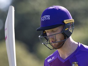 FILE - In this Thursday, Dec. 14, 2017 file photo, England cricketer Ben Stokes walks from the field following his innings of 93 runs in his match for the Canterbury Kings against the Otago Volts in a Twenty/20 match Christchurch, New Zealand. Prosecutors have charged England cricketer Ben Stokes with affray after a violent incident in Bristol in September, it was announced on Monday, Jan. 15, 2018.