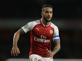 FILE - In this Tuesday, Oct. 24, 2017 file photo, Arsenal's Theo Walcott watches for the ball during their English League Cup soccer match between Arsenal and Norwich at the Emirates Stadium in London. Theo Walcott has joined Everton in a bid to reignite his career after 12 years at Premier League rival Arsenal. Everton announced the signing of the 28-year-old winger on Wednesday, Jan. 17, 2018.