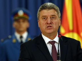 FILE- In this Friday, Oct. 28, 2016 file photo, Macedonia's President Gjorge Ivanov speaks during a media conference after talks with his Serbian counterpart Tomislav Nikolic, in Belgrade, Serbia. Macedonia's president on Wednesday, Jan. 17, 2018 vetoed a law making Albanian the country's second official language, describing the legislation as unnecessary and unconstitutional.