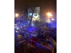 This image taken from the Twitter page of Sigrid Vermeulen shows  a collapsed building in Antwerp, Belgium, Monday Jan. 15, 2018.