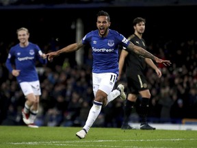 Everton's Theo Walcott celebrates scoring his side's first goal of the game during their English Premier League soccer match against Leicester City at Goodison Park, Liverpool, England, Wednesday, Jan. 31, 2018.