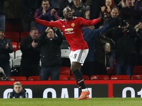 Manchester United's Romelu Lukaku celebrates scoring his side's second goal of the game against Derby County during the FA Cup, third round match at Old Trafford in Manchester, England, Friday Jan. 5, 2018.