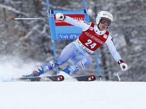 FILE- In this Sunday, Dec. 17, 2017 file photo, United States' Julia Mancuso competes during an alpine ski, women's World Cup super-G, in Val d'Isere, France. Slowed by persistent hip problems, four-time Olympic medalist Julia Mancuso has announced she will retire after a goodbye run in a World Cup downhill Friday,  Jan. 19, 2018.