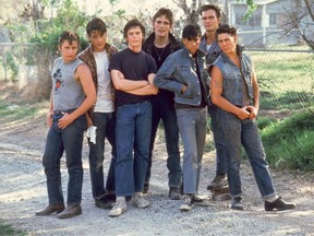 Emilio Estevez, Rob Lowe, C. Thomas Howell, Matt Dillon, Ralph Macchio, Patrick Swayze and Tom Cruise in The Outsiders.