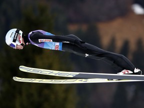Kamil Stoch of Poland soars through the air during his trial jump at the second stage of the 66th four hills ski jumping tournament in Garmisch-Partenkirchen, Germany, Monday, Jan. 1, 2018.