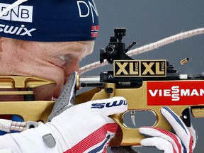 Johannes Thingnes Boe of Norway shoots during the men's 15km mass start competition at the biathlon World Cup in Ruhpolding, Germany, Sunday, Jan. 14, 2018.