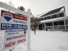 This Monday, Jan. 8, 2018, photo, shows an existing home for sale in Walpole, Mass. On Thursday, Jan. 18, 2018, Freddie Mac reports on the week's average U.S. mortgage rates.