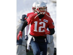 New England Patriots quarterback Tom Brady warms up during an NFL football practice, Friday, Jan. 19, 2018, in Foxborough, Mass. The Patriots host the Jacksonville Jaguars in the AFC championship on Sunday in Foxborough.