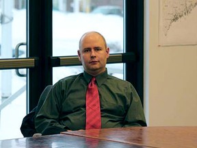 Town Manager Tom Kawczynski sits in the Jackman, Maine, town hall on Tuesday, Jan. 23, 2018, before a select board meeting over his publicly espoused white separatist views. The Jackman Select Board voted unanimously to dismiss him, announcing the decision after a closed-door executive session with Kawczynski, who had been the town's top administrator since June.