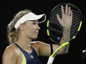 Denmark's Caroline Wozniacki celebrates after defeating Kiki Bertens of the Netherlands in their third round match at the Australian Open tennis championships in Melbourne, Australia, Saturday, Jan. 20, 2018.