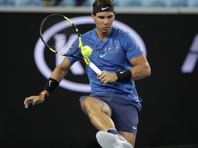 Spain's Rafael Nadal kicks the ball during a practice match against Austria's Dominic Thiem on Margaret Court Arena ahead of the Australian Open tennis championships in Melbourne, Australia Friday, Jan. 12, 2018.