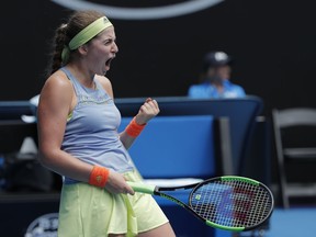 Latvia's Jelena Ostapenko celebrates a point win over Francesca Schiavone of Italy during their first round match at the Australian Open tennis championships in Melbourne, Australia, Monday, Jan. 15, 2018.