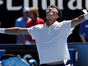 South Korea's Chung Hyeon celebrates after defeating United States' Tennys Sandgren in their quarterfinal at the Australian Open tennis championships in Melbourne, Australia, Wednesday, Jan. 24, 2018.