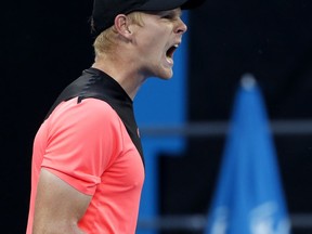 Britain's Kyle Edmund celebrates a point win over Italy's Andreas Seppi during their fourth round match at the Australian Open tennis championships in Melbourne, Australia Sunday, Jan. 21, 2018.