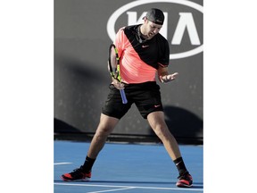 United States' Jack Sock reacts to a lost point against Japan's Yuichi Sugita during their first round match at the Australian Open tennis championships in Melbourne, Australia, Monday, Jan. 15, 2018.