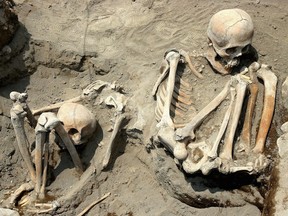 Two of fifty Pre-Hispanic human skeletons found by archaeologists at the Mexican National Institute of Anthropology and History in Chalco Valley, southwestern Mexico in 2005, dating back to the Aztec I phase.