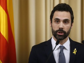Roger Torrent, Speaker of Catalan Parliament speaks during a press conference at the Catalonia Parliament in Barcelona, Spain, Monday, Jan. 22, 2018. The speaker of Catalonia's parliament has proposed former regional leader Carles Puigdemont as candidate to form a government, despite his status as a fugitive from Spanish justice.