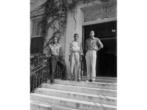This Sept. 1955 photo provided by the Roland Giduz Photographic Collection/The Wilson Library at UNC Chapel Hill, shows from left, LeRoy Frasier, John Lewis Brandon and Ralph Frasier on the steps of the University of North Carolina at Chapel Hill, N.C. LeRoy Frasier, who along with his brother and another high school student was among the first African-American undergraduate students to successfully challenge racial segregation at North Carolina's flagship public university, has died at the age of 80. Fraser died of heart failure on Dec. 29, 2017, in New York City. (Roland Giduz Photographic Collection/The Wilson Library, UNC Chapel Hill via AP)