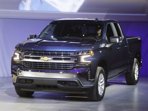 The 2019 Chevrolet Silverado High Country pickup is unveiled, Saturday, Jan. 13, 2018, in Detroit. The Silverado is the second-best selling vehicle in the U.S. and is outsold only by Ford's F-Series pickups. Big pickup truck sales rose nearly 6 percent last year to almost 2.4 million, even though total U.S. auto sales dropped 2 percent. One in every seven vehicles sold last year was a full-size pickup.