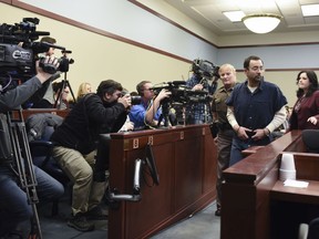Larry Nassar enters circuit court Thursday, Jan. 18, 2018, during the third day of victim impact statements in Lansing, Mich. Nassar, 54, faces a minimum sentence of 25 to 40 years in prison for molesting girls at Michigan State University and his home. He also was a team doctor at USA Gymnastics, based in Indianapolis, which trains Olympians. He's already been sentenced to 60 years in federal prison for child pornography crimes.