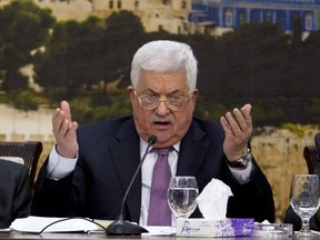 Palestinian President Mahmoud Abbas, speaks during a meeting with the Palestinian Central Council, a top decision-making body, at his headquarters in the West Bank city of Ramallah, Sunday, Jan. 14, 2018.