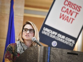 In this Nov. 20, 2017 photo, state Rep and candidate for Lt. Governor Peggy Flanagan speaks at a rally in St. Paul., Minn. Minnesota Public Radio News said Friday, Jan. 12, 2018, it was removing Tom Weber from his weekday morning show soon after learning of his relationship Flanagan. Weber frequently discussed Minnesota politics and hosted well-known politicians during his program.