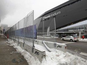 In this Thursday, Jan. 25, 2018 photo, barricades are viewed near U.S. Bank Stadium in preparation for the NFL Super Bowl football game in Minneapolis. The Philadelphia Eagles play the New England Patriots on Sunday, Feb. 4.
