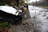 Mud fills a street after a rain-driven mudslide destroyed two cars and damaged property in a neighborhood under mandatory evacuation in Burbank, California, January 9, 2018.