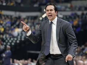 Miami Heat coach Erik Spoelstra yells to officials during the first half of the team's NBA basketball game against the Indiana Pacers in Indianapolis, Wednesday, Jan. 10, 2018. Spoelstra received a technical on the exchange.