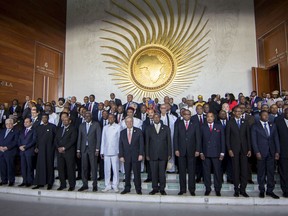 Heads of state pose for a group photograph during the opening ceremony of the African Union summit in Addis Ababa, Ethiopia, Sunday, Jan. 28, 2018. The leaders of the United Nations and the African Union urged stronger international cooperation Sunday of the African Union nations.