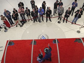NASCAR great Richard Petty, bottom right, walks the red carpet as he arrives for NASCAR's Hall of Fame induction ceremony in Charlotte, N.C., Friday, Jan. 19, 2018.