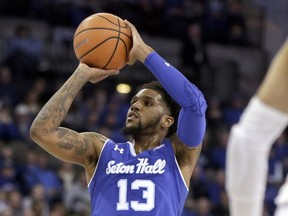 Seton Hall's Myles Powell (13) shoots during the first half of an NCAA college basketball game against Creighton in Omaha, Neb., Wednesday, Jan. 17, 2018.