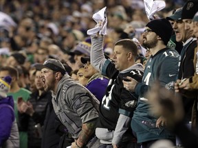 Fans cheer during the first half of the NFL football NFC championship game between the Philadelphia Eagles and the Minnesota Vikings Sunday, Jan. 21, 2018, in Philadelphia.