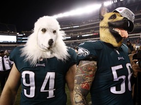 Philadelphia Eagles' Beau Allen and Chris Long celebrate after the NFL football NFC championship game against the Minnesota Vikings Sunday, Jan. 21, 2018, in Philadelphia. The Eagles won 38-7 to advance to Super Bowl LII.