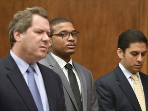 FILE- In this Sept. 22, 2017, file photo, Khari Noerdlinger, center, stands with attorneys Lee Vartan, right, and Jeffrey Lichtman, in court in an motion to get weapons charges dropped in Hackensack, N.J. A lawyer for Noerdlinger says a New Jersey judge on Tuesday, Jan. 2, 2018, OK'd the 21-year-old to enter a pretrial program through which his obstruction and weapon charges will be wiped from his record after six months.