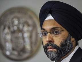 FILE- In this Dec. 12, 2017, file photo, Bergen County Prosecutor Gurbir Grewal looks on as Governor-elect Phil Murphy nominates him for attorney general in Trenton, N.J.  The New Jersey Senate has confirmed Grewal, the nation's first Sikh state attorney general, on Tuesday, Jan. 16, 2018.