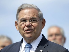 FILE - In this Aug. 17, 2017, file photo, U.S. Sen. Bob Menendez, D-N.J., speaks during a news conference in Union Beach, N.J. In a Friday, Jan. 19, 2018, court filing, the government has told a federal judge in New Jersey it will seek a retrial of Menendez, whose 11-week corruption trial ended in a hung jury on Nov. 16, 2017.