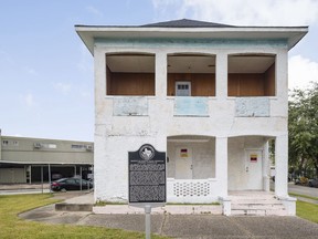 This Jan. 9, 2018 photo provided by The National Trust for Historic Preservation shows the LULAC Council 60 Clubhouse in Houston that remains damaged a month after Hurricane Harvey inflicted more harm to the aging building. The clubhouse connected to the Mexican-American Civil Rights movement has been designated as a National Treasure and will share part of a $450,000 grant in an effort to raise money for restore historic buildings damaged by last year's hurricanes, the National Trust for Historic Preservation announced Tuesday, Jan. 30, 2018.