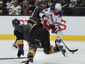 New York Rangers left wing J.T. Miller (10) looks for an opportunity to shoot past Vegas Golden Knights defenseman Brayden McNabb (3) in the first period of an NHL hockey game on Sunday, Jan. 7, 2018.