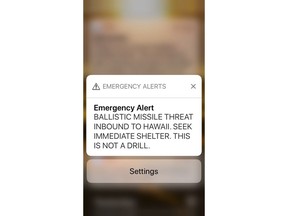 This smartphone screen capture shows a false incoming ballistic missile emergency alert sent from the Hawaii Emergency Management Agency system on Saturday, Jan. 13, 2018.